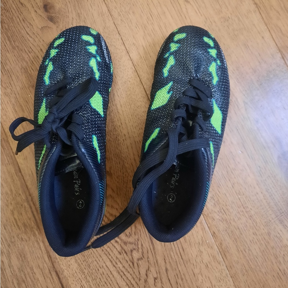 Kids Black and Green soccer cleats